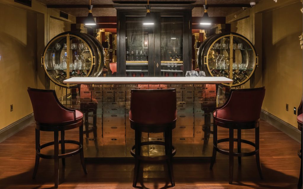 A bar made with the facades of safe deposit boxes